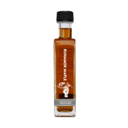 Runamok Maple Syrups - Smoked with Pecan Wood in a bottle with black cap, ideal for enhancing waffles, pancakes, or coffee with its rich, smoky flavor.