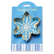 Ann Clark | Holiday Gift Cookie Cutters - Gingerbread House Kit-4 features a snowflake-shaped cutter in protective blue packaging, enhancing your baking creativity.