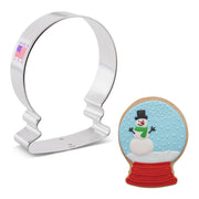 Ann Clark | Holiday Cookie Cutters - Ugly Sweater-2.75 x 4.25 alongside a snow globe cookie with a snowman, showcasing creative baking possibilities.