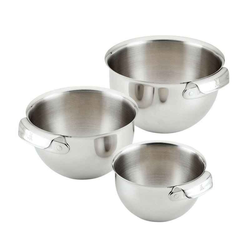 Hestan Provisions | 7QT Stainless Steel Mixing Bowl, featuring flared rims and ergonomic handles, showcased among a set of durable, heat-safe kitchen bowls.