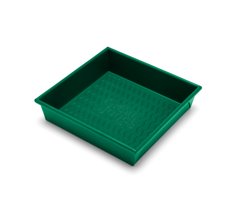 Great Jones | Square One - Broccoli: A 9x9-inch square baking pan with a wavy, corrugated bottom for easy release, nonstick and nontoxic, ideal for even baking.