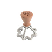 Marcato 3 Flower Ravioli Stamp with wooden handle, designed for creating uniform flower-shaped ravioli, perfect for homemade pasta enthusiasts.