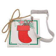 Ann Clark | Holiday Gift Cookie Cutters - Gingerbread House Kit-4 featuring a boot-shaped cutter on a branded card, ideal for festive baking creativity.