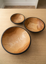 Handmade Ukrainian Charred Wooden Salad Bowls, Set of 3: Small, Medium, Large, featuring natural wood patterns, ideal for serving, showcasing in any kitchen.