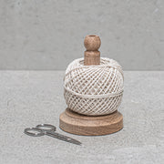 Earth & Nest | String Tidy + Scissors features a wooden stand with cooking string and scissors, ideal for kitchen or craft organization.