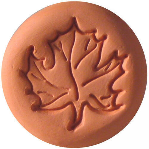 Close-up of the Sugar Saver - Maple Leaf in terracotta, designed to keep brown sugar soft by soaking and placing in sugar containers.