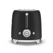 Smeg | 2 Slice Toaster - Black with chrome trim, featuring lever, defrost, reheat, and STOP buttons. Ideal for compact spaces, offers versatile toasting with six levels.