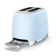 Smeg | Toaster - Pastel Blue: A 50's retro style toaster with two slots, polished chrome base, and pull-out crumb tray, perfect for stylish kitchen setups.