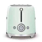 Smeg | Toaster - Pastel Green, featuring two slots, six toasting levels, chrome accents, and defrost, reheat, and bagel functions, ideal for compact kitchen spaces.