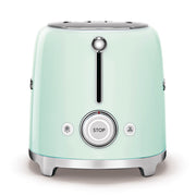 Smeg | Toaster - Pastel Green, two-slot with six toasting levels, defrost, reheat, and bagel functions; features polished metal accents and crumb tray for easy cleaning.