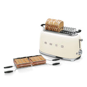 Smeg | 50's Retro Style Aesthetic 4 Slice Toaster Cream China with warming rack and chrome sandwich racks, perfect for stylish, versatile toasting.
