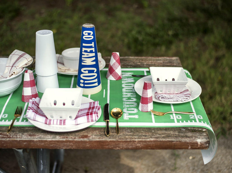 Hester & Cook Tailgate Collection Die Cut Football Place Mat, perfect for enhancing sport-themed gatherings, complements kitchen essentials from Athens Cooks for a festive atmosphere.