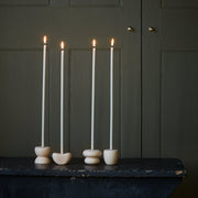 The Floral Society | Long Stem Beeswax Candles, Blossom, elegantly lit on ceramic holders, showcasing minimalist design for intimate settings. Perfect for curated kitchen and dining experiences.