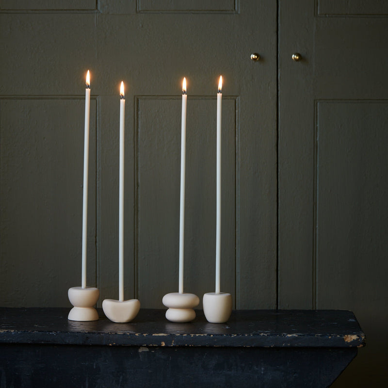 The Floral Society | Long Stem Beeswax Candles, Blossom, elegantly lit on ceramic holders, showcasing minimalist design for intimate settings. Perfect for curated kitchen and dining experiences.