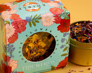 Flouwer Co. | Floral Garnishing Salt in eco-friendly packaging, showcasing its award-winning blend of sea salt, edible flower petals, and herbs for culinary enhancement.