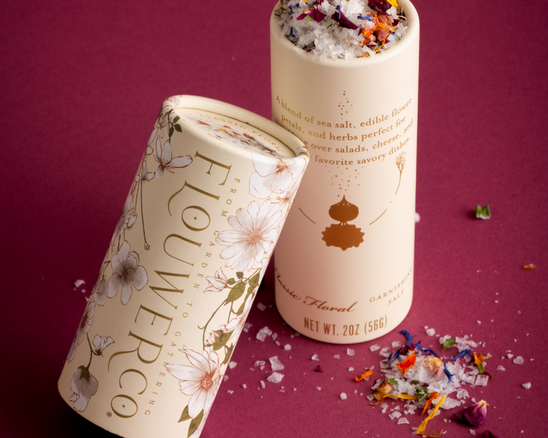 Flouwer Co. | Floral Garnishing Salt in eco-friendly packaging, showcasing sea salt blended with edible flower petals and herbs, awarded 2023 sofi™ GOLD.