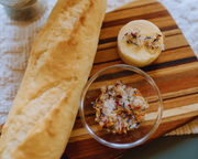 Flouwer Co. | Floral Garnishing Salt, awarded 2023 sofi™ GOLD, features sea salt with edible flower petals and herbs in eco-friendly packaging, ideal for enhancing dishes.