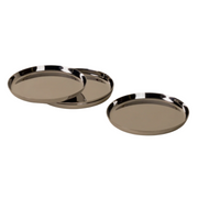 Holcomb Studio | Puddle Coasters, Set of Four: Round silver stainless steel coasters with anti-slip pads, designed to protect surfaces from condensation and fit neatly when stacked.