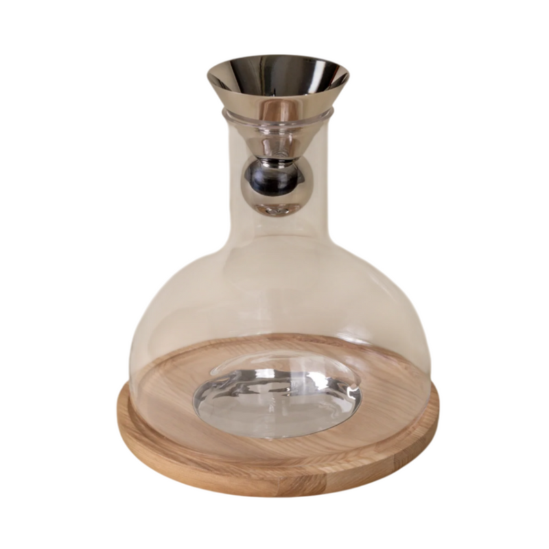 Holcomb Studio | Birdie Wine Decanter featuring a glass body with a wooden base and a silver aerating sphere for enhancing wine aroma and flavor.