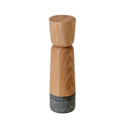 Holcomb Studio | Stone Pepper Mill: A wooden salt shaker featuring a grey base, inspired by grain mills, showcasing a tactile design with contrasting granite and ash wood elements.
