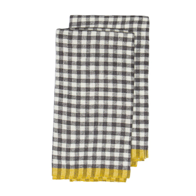 Caravan Home | 20 x 30 Gingham Grey & Dijon Towels: A folded cotton kitchen towel in black-and-white gingham with yellow trim, perfect for adding charm to any kitchen.
