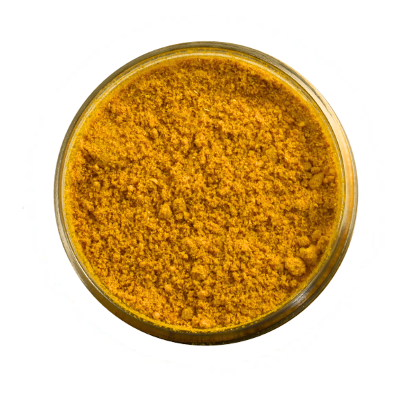 San Juan Island Sea Salt | Golden Curry Seasoning Blend in a bowl, featuring a vibrant yellow powder, ideal for enhancing roasted cauliflower or chicken dishes.