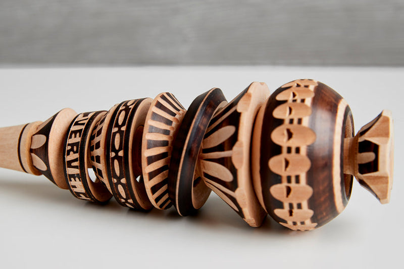 Large wooden whisk molinillo, ideal for frothing Mexican hot chocolate and muddling ingredients, showcasing craftsmanship from Athens Cooks kitchen store.