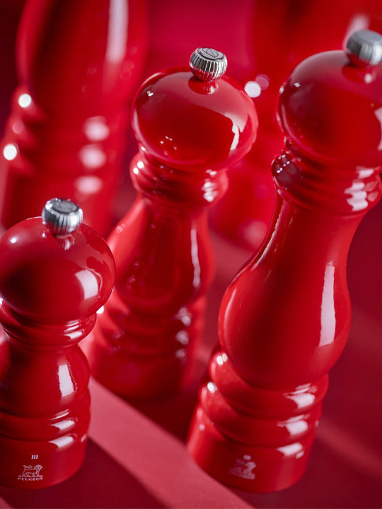 Peugeot | Paris Chef u'Select Passion Red Pepper Mill, 12 inches, featuring a glossy hourglass body with adjustable grind settings, showcases premium craftsmanship from France.