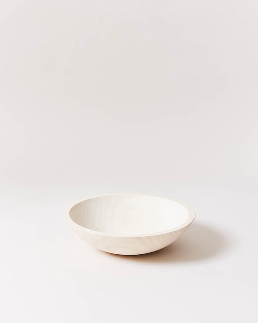 Farmhouse Pottery | Crafted Wooden Bowls - 12 Inches White: A minimalist, smooth, shallow wooden bowl exemplifying farm-to-table design, ideal for serving or decor.