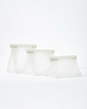 W&P | Roll Tight Storage Bags - Assorted Set of 3, featuring bendable crimping bars for airtight storage, visible contents, and reusable, compact design for freezer, fridge, or pantry organization.