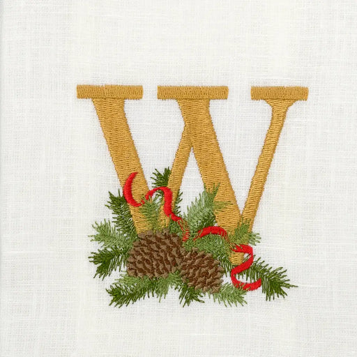 Arte Italica & Crown Linen Designs Winter Pine Monogram Towel, W, featuring golden embroidered W with pine sprigs, pinecones, and red ribbon on linen.