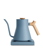 FELLOW | Stagg EKG Pro Electric Kettle, Hazy Blue w/ Maple, on base with control dial, ideal for precision brewing coffee or tea.