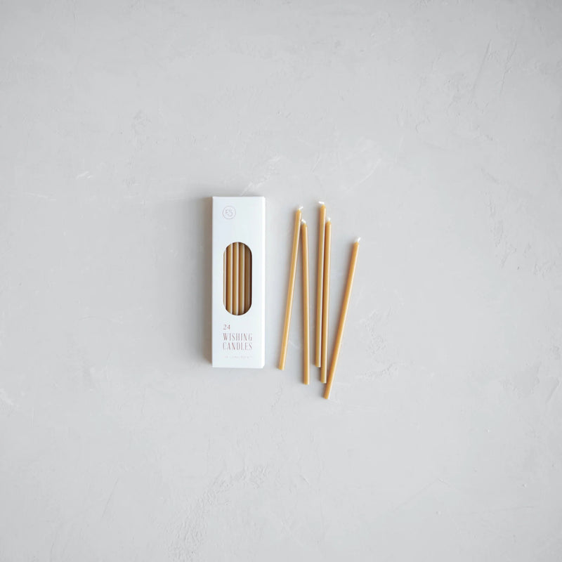 The Floral Society | Wishing Candles, Miel: A minimal flat lay shows a box of 24 slim candles with six displayed, perfect for celebratory moments.
