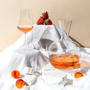 Richard Brendon | Jancis Robinson Young Wine Decanter elegantly displayed with a glass of wine and fresh fruit, highlighting its role as a dinner party centerpiece.