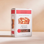Rustic Bakery - Artisan Crisps - Tart Cherry, Cacao Nib & Almond Box, featuring a crisp image and window showcasing crackers, ideal with fine cheese.