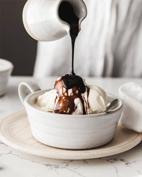 Farmhouse Pottery - Silo Soup Mug cradling vanilla ice cream with hot fudge pouring over, showcasing its versatile, handcrafted design from Vermont.