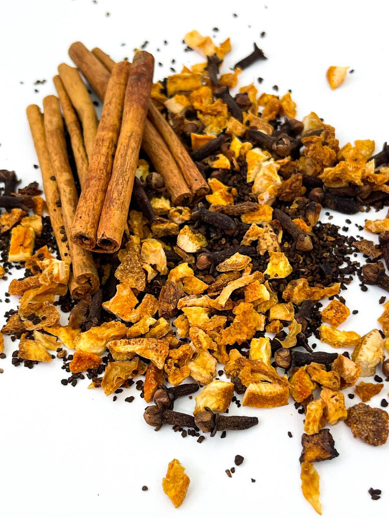 Oliver Pluff & Company - Orange Clove Hot Toddy Kit featuring cinnamon sticks, orange peel, cloves, and chicory, perfect for crafting a warming winter beverage.