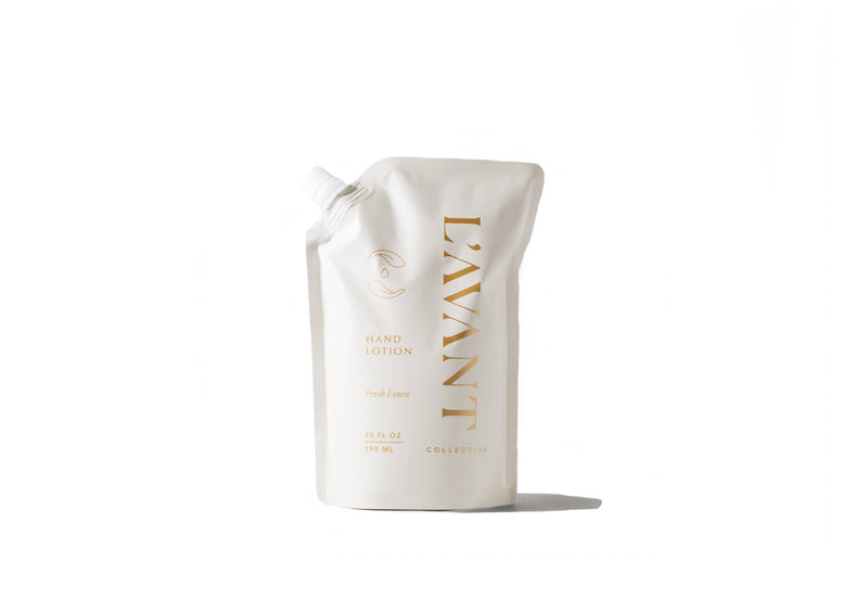 L'AVANT Collective - Hand Lotion Refill Pouch Fresh Linen, 20 fl oz. Soft, spouted pouch for easy refilling, featuring a fresh linen scent.