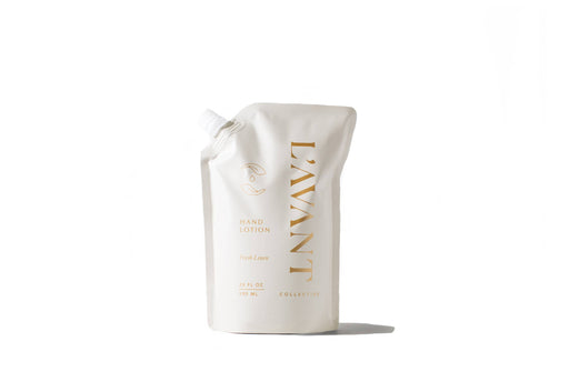 L'AVANT Collective - Hand Lotion Refill Pouch Fresh Linen, 20 fl oz. Soft, spouted pouch for easy refilling, featuring a fresh linen scent.