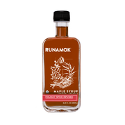 Runamok - Holiday Spice Infused Maple Syrup 250ml bottle with botanical label, featuring cinnamon, ginger, nutmeg, vanilla, and clove, ideal for gifting and festive culinary uses.