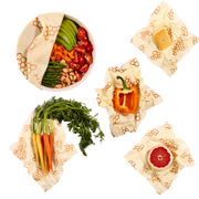 Bee's Wrap - Assorted 5 Pack - Honeycomb, showcasing reusable wraps with vegetables and cheese, ideal for kitchen storage and sustainability.
