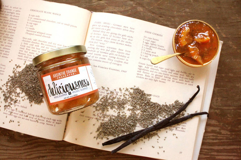 RedCamper - Absinthe Orange Deliciousness Marmalade - 9 oz (Cheeseboard) jar, showcasing sophisticated blend of organic citrus, vanilla, and absinthe, ideal for enhancing diverse dishes.