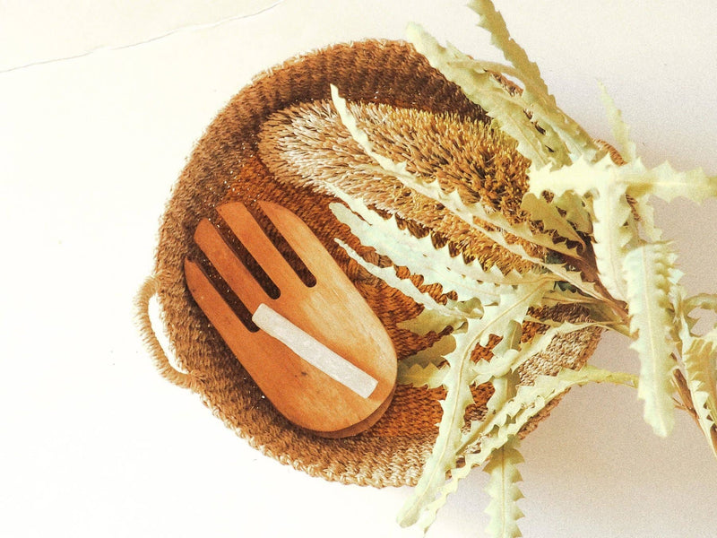NEEPA HUT - Iris Tray I Yellow, a handwoven seagrass tray with a yellow circle, ideal for serving or decor, made by skilled artisans in the Philippines.