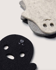Graf Lantz - Merino Wool Spooky Coaster Multi 4 Pack featuring ghost-face shaped felt coasters, showcasing durability and style with beaded water droplets on black felt.