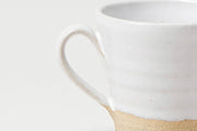 Farmhouse Pottery - Silo Espresso Cup: Single, featuring white-glazed top and sandy-textured clay base, ideal for pulling espresso shots. Wheel thrown in Vermont, dishwasher safe.