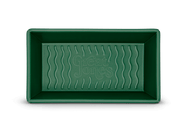 Great Jones | Breadwinner - Raspberry, a green rectangular loaf pan with a wavy, corrugated bottom, designed for nonstick, scratch-resistant baking.