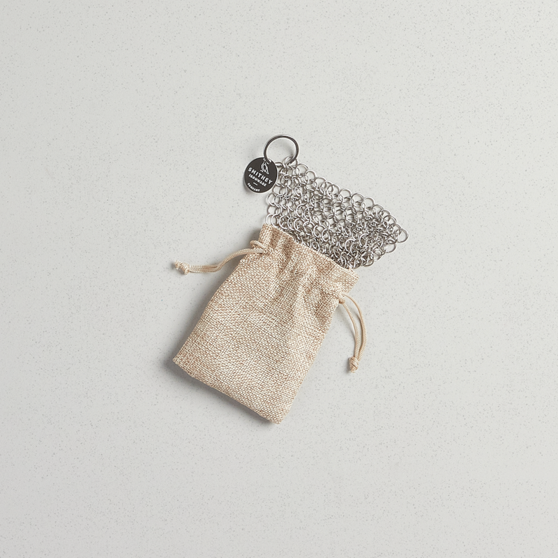 Smithey stainless steel chainmail scrubber with logo tag and drawstring bag