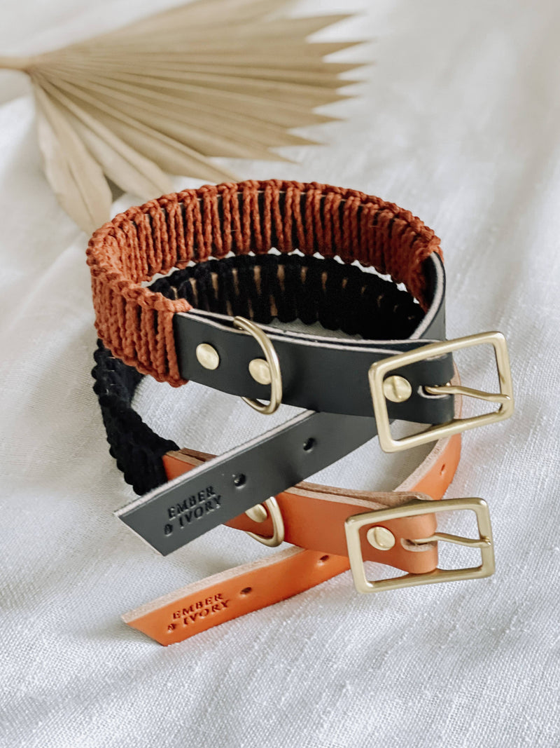 EMBER & IVORY - Black/Rust WIDE Leather & Macrame Collar: Small, featuring woven and leather elements with brass fittings, styled on textured cloth.