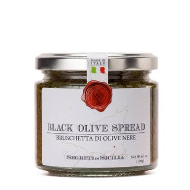 Frantoi Cutrera Black Olive Spread, 6.7oz jar by Segreti di Sicilia, featuring olives, garlic, and herbs. Ideal for enhancing appetizer plates.