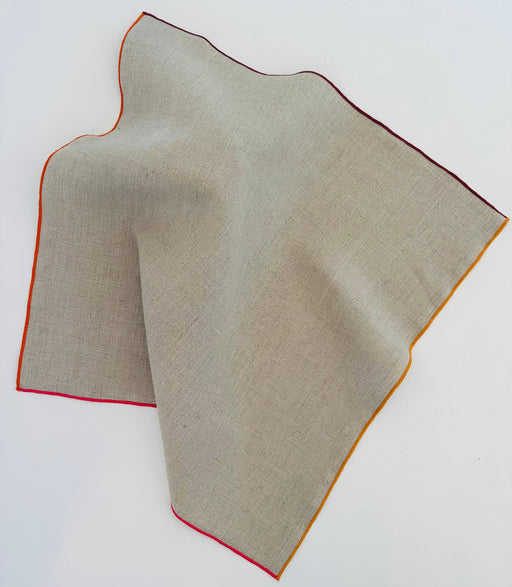 Tisch New York - Napkins, Natural Linen (Pink hem), features a light-beige, loosely woven linen square with colorful hem, ideal for enhancing table settings.